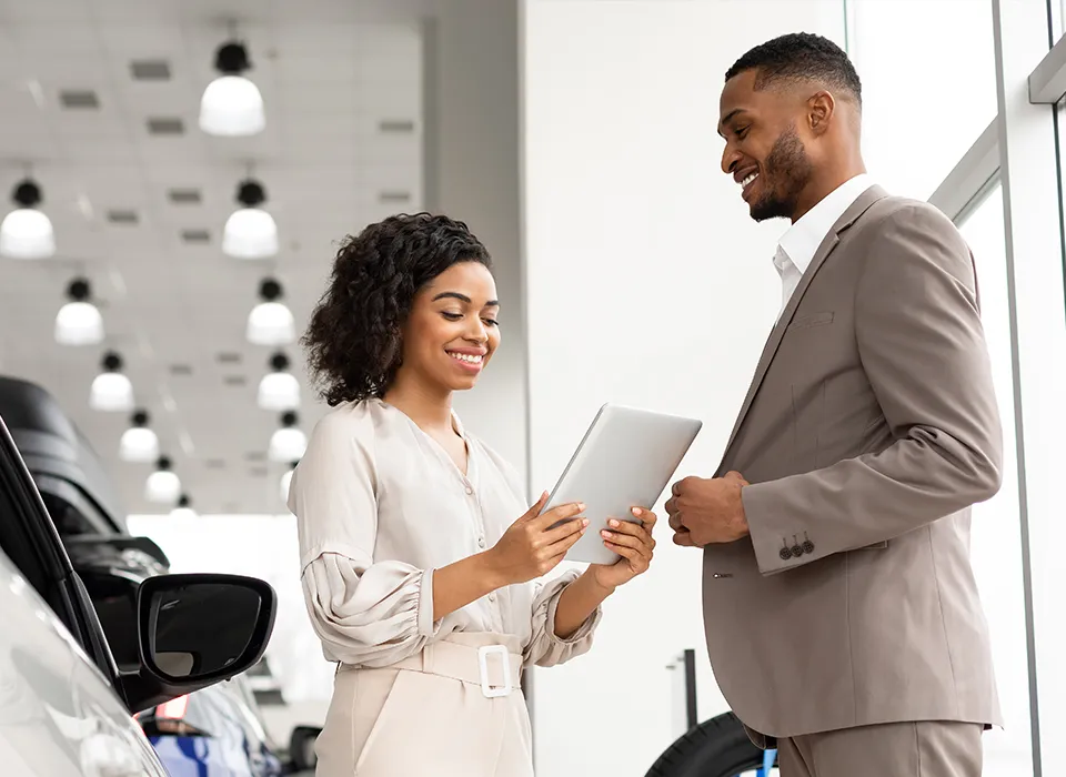Salesperson presenting a contract to a customer