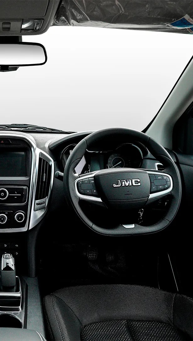 Vigus Pro interior with focus on the driver's seat and steering wheel