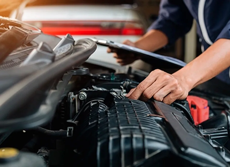 Mechanic repairing the engine